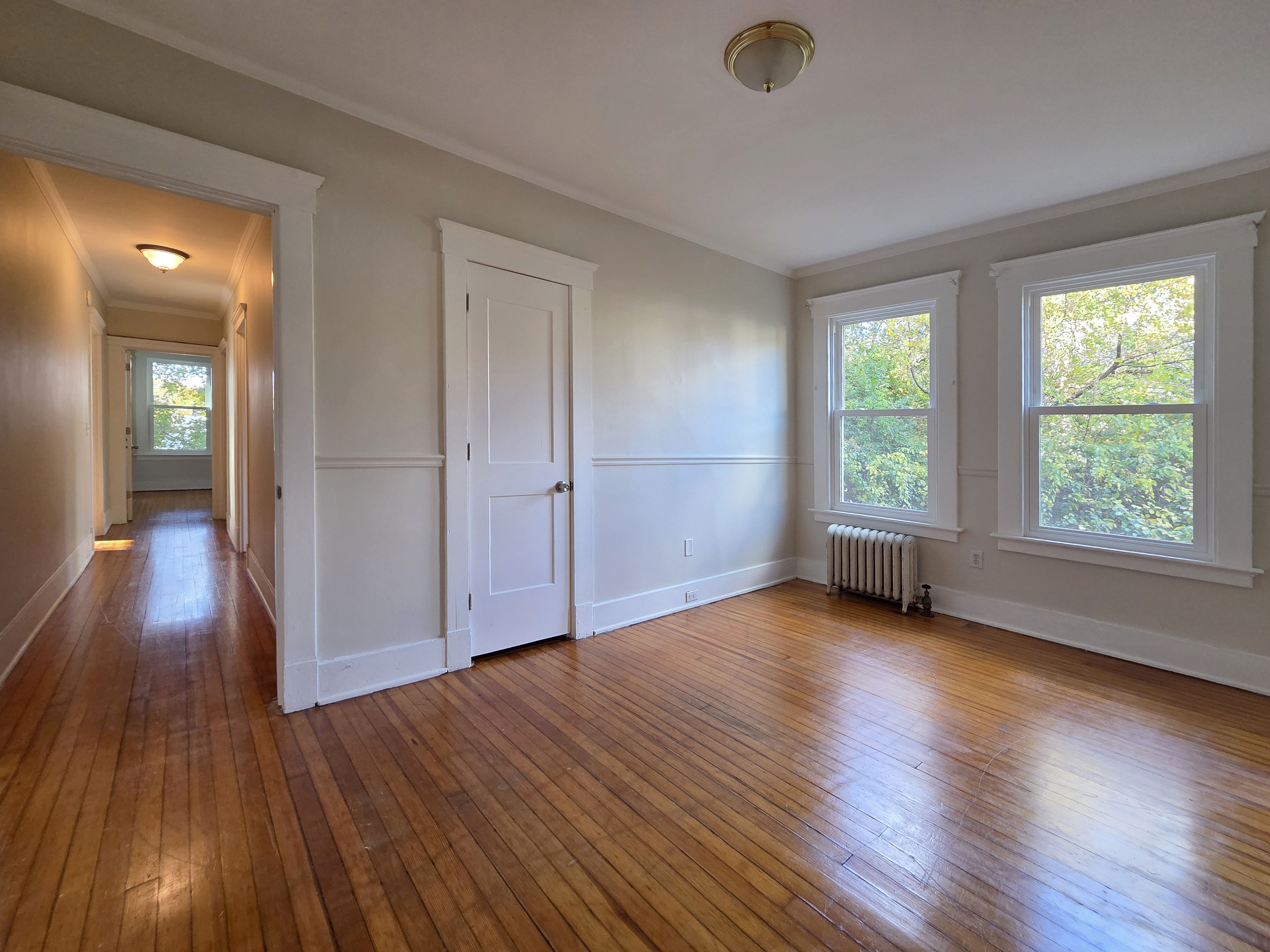 302 Lexington Avenue New Haven, CT 06513 - Photo 21 of 24 wooden floor in an empty room with a window