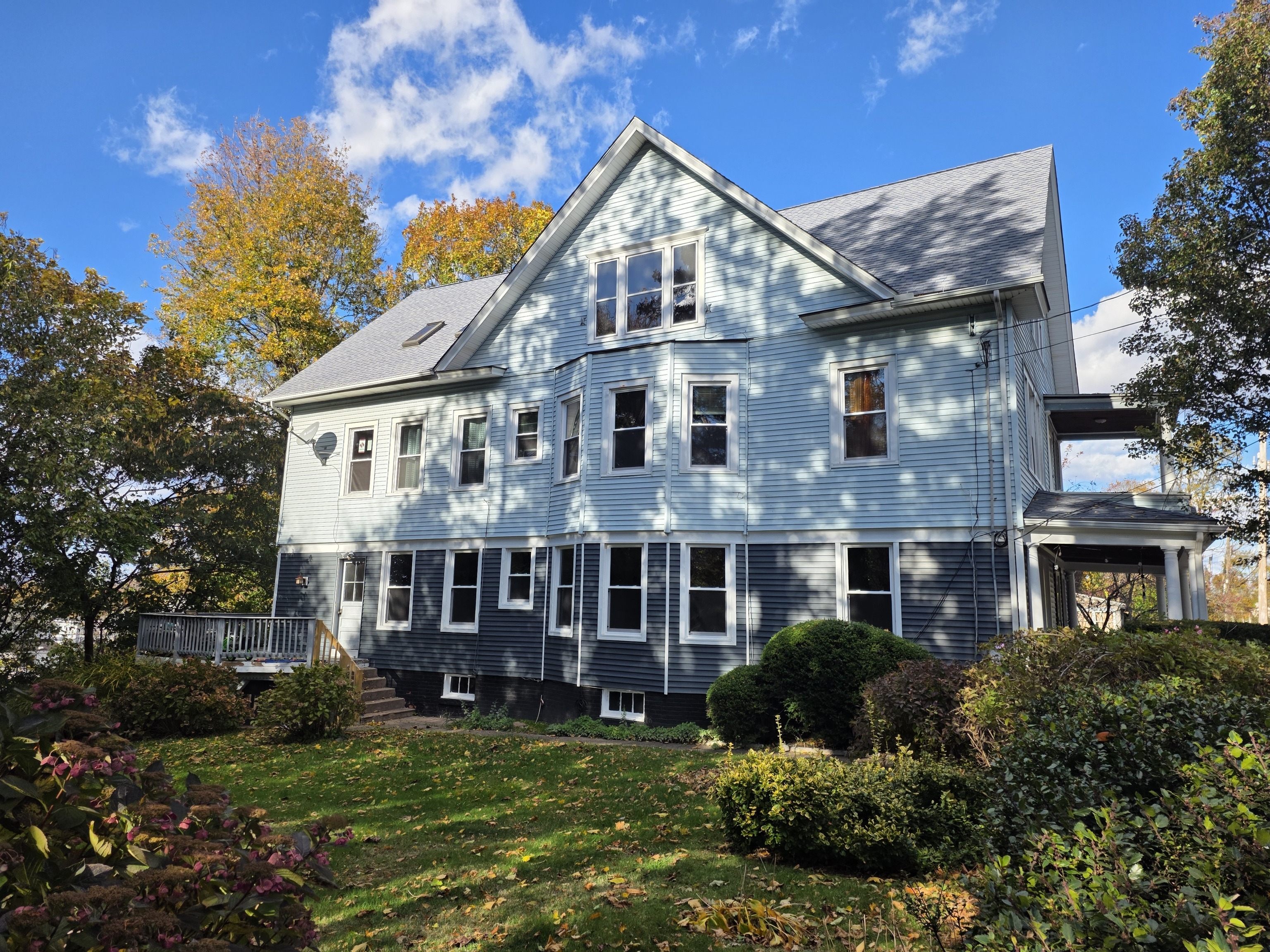 302 Lexington Avenue New Haven, CT 06513 - Photo 23 of 24 a view of a big house with a big yard and potted plants