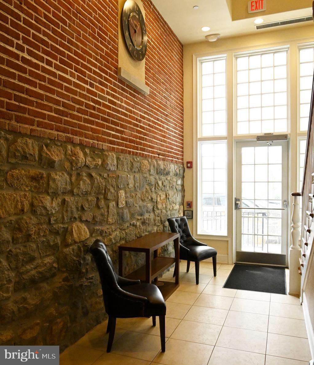 108 East Lancaster Avenue, Unit B2 Wayne, PA 19087 - Photo 6 of 28 Back lobby to parking