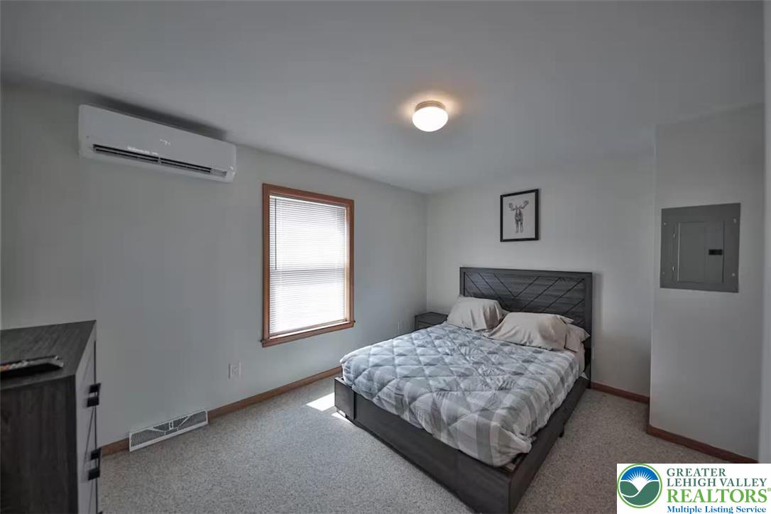 1500 Rock Street, Unit 2 Lehighton, PA 18235 - Photo 17 of 42 a bedroom with a bed and a window