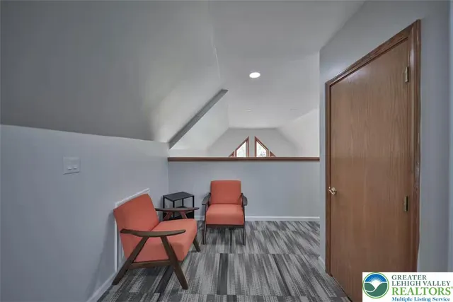 a workspace with furniture and wooden floor