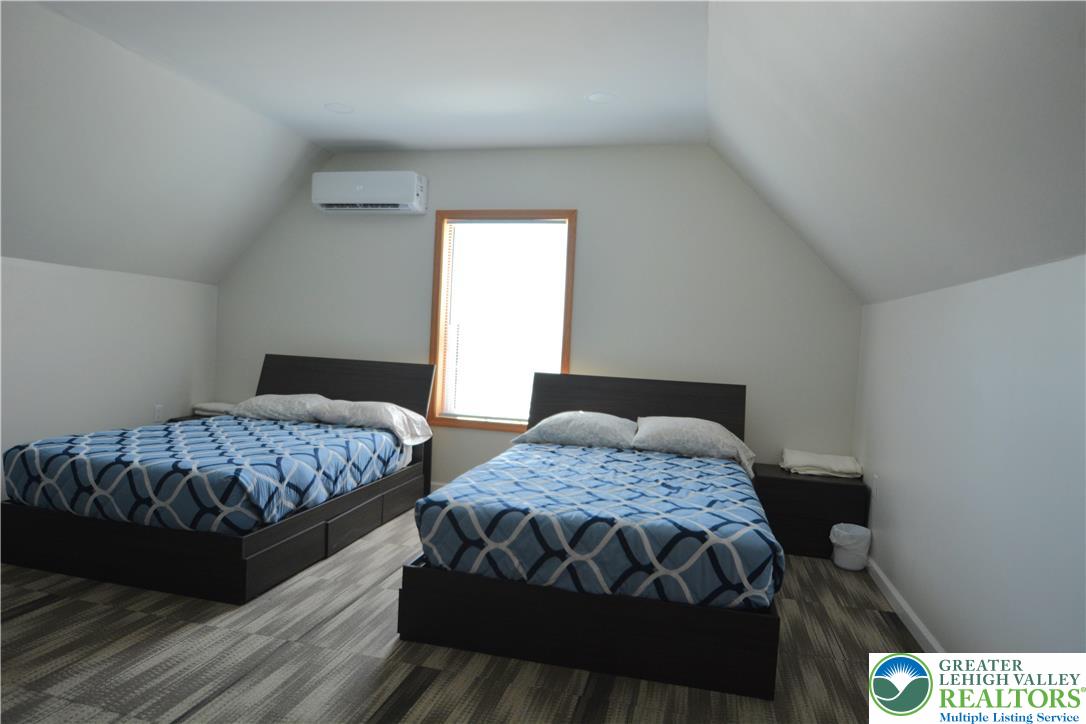 1500 Rock Street, Unit 2 Lehighton, PA 18235 - Photo 35 of 42 a bedroom with two beds and a window