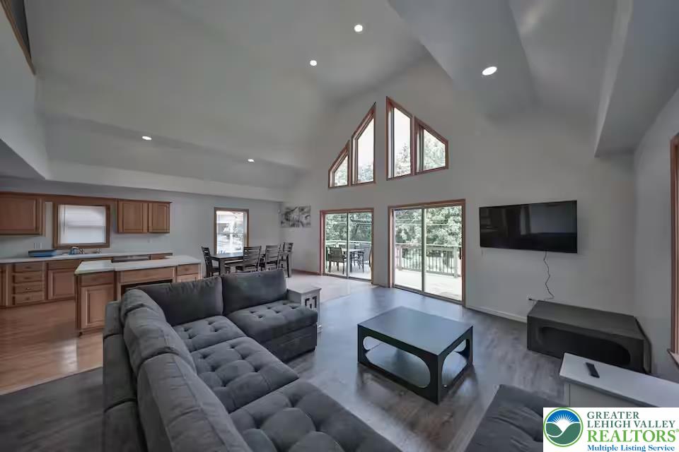 1500 Rock Street, Unit 2 Lehighton, PA 18235 - Photo 7 of 42 a living room with furniture ceiling fan and a window
