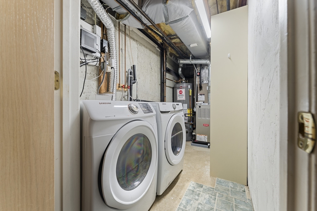 22 Arrowhead Circle, Unit 22 Ashland, MA 01721 - Photo 32 of 35 a utility room with dryer and washer