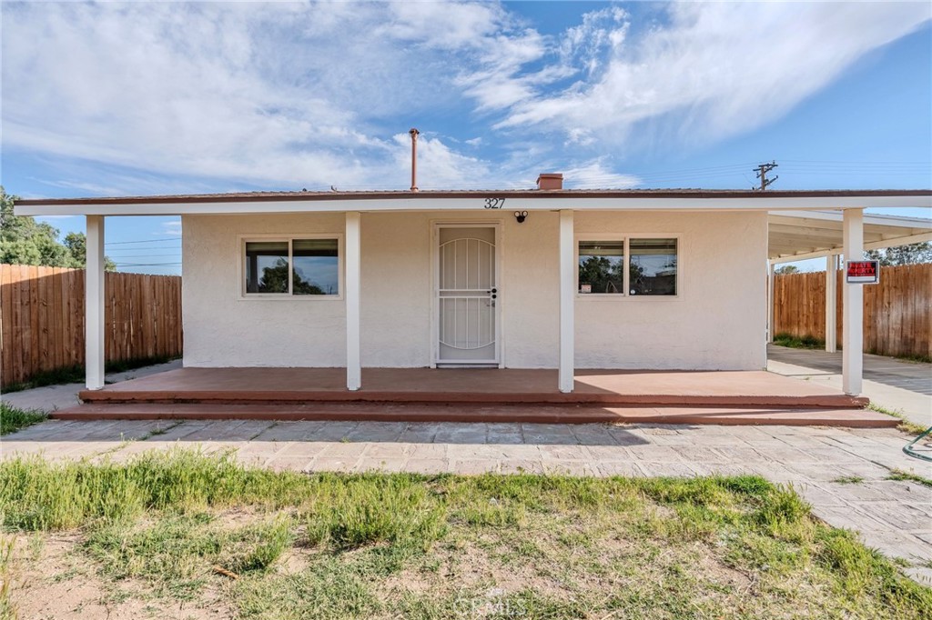 327 West Haloid Avenue Ridgecrest, CA 93555 - Photo 1 of 1 a front view of a house with garden