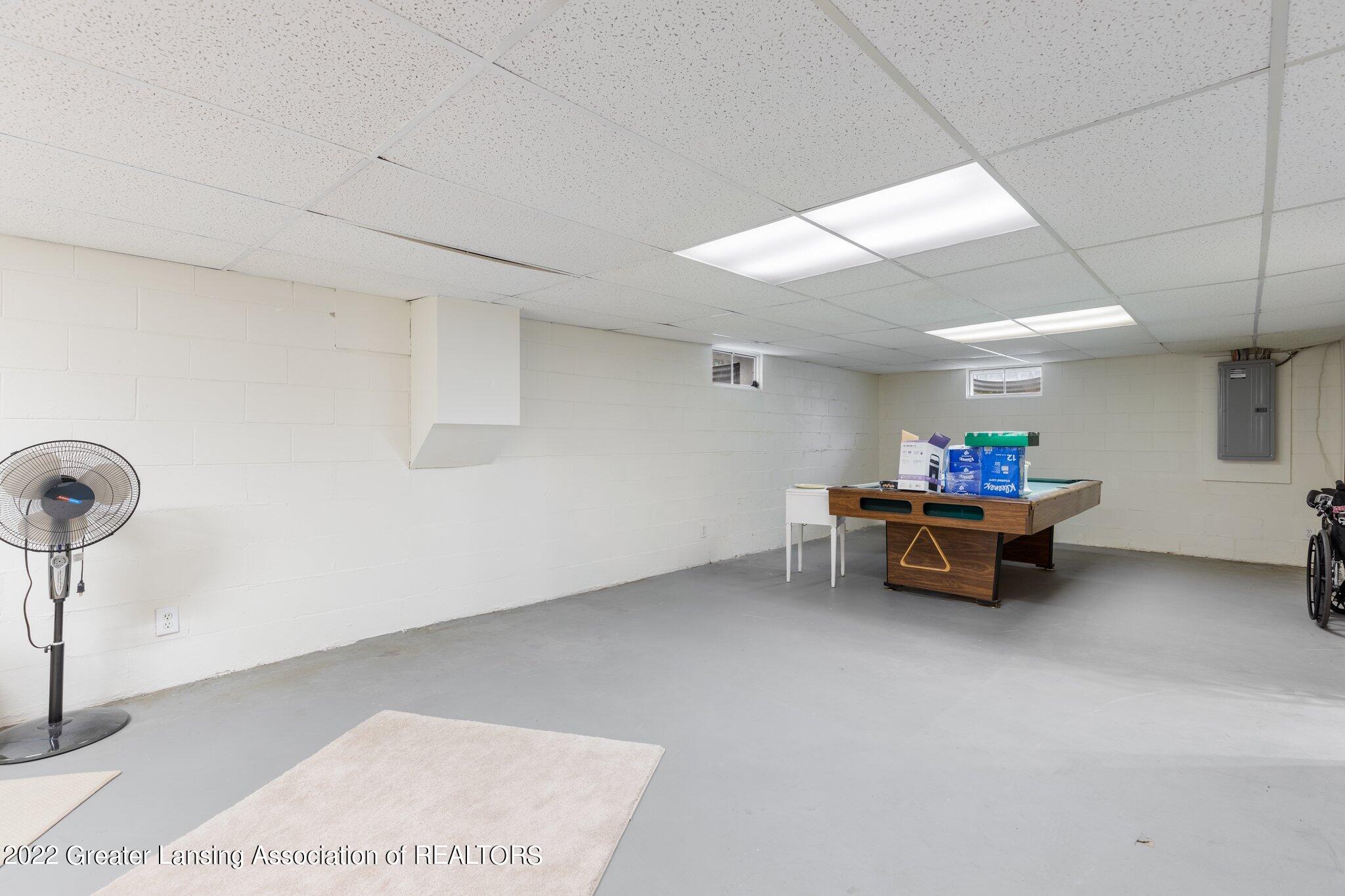 99 South Aurelius Road Mason, MI 48854 - Photo 21 of 32 99, partial finished basement
