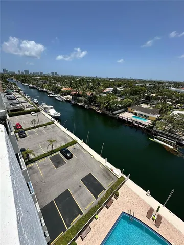 an aerial view of a balcony with a ocean view