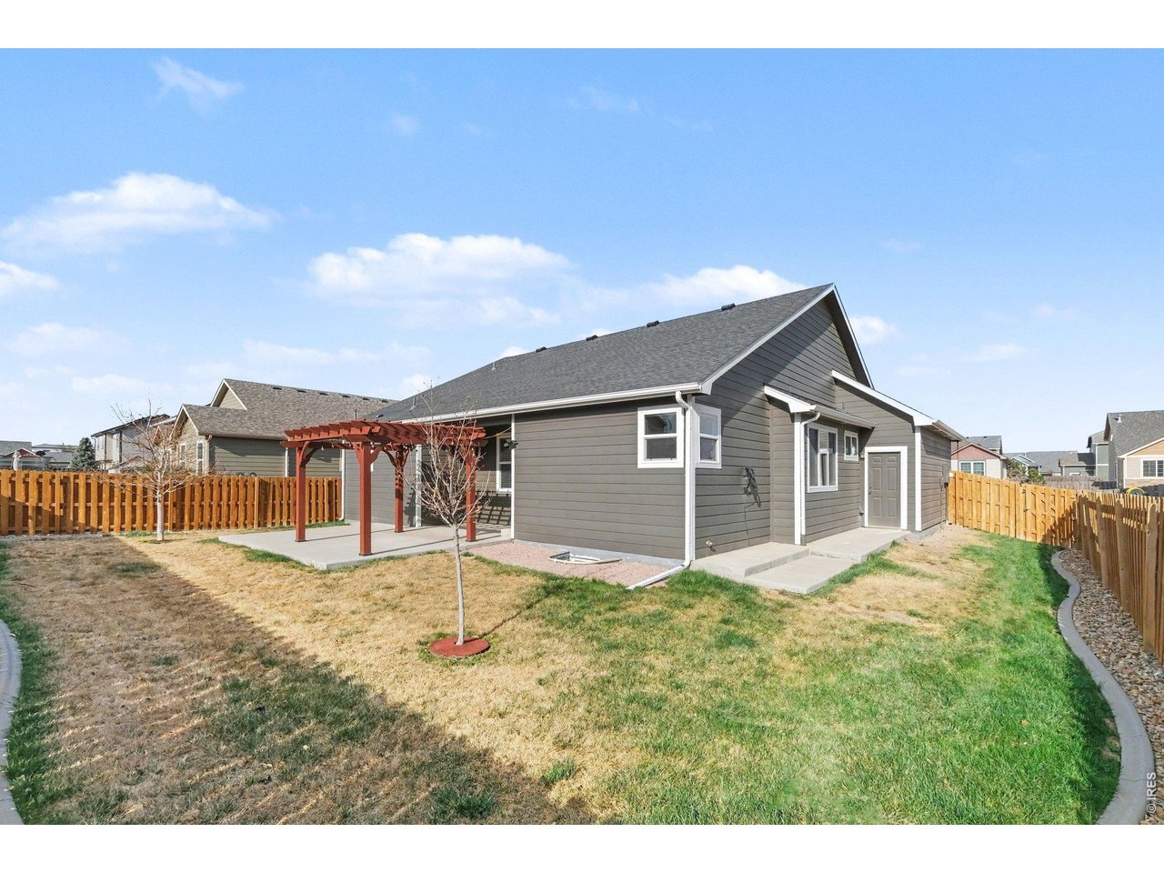 7347 Atlantis Street Wellington, CO 80549 - Photo 15 of 23 Large backyard with sprinkler system