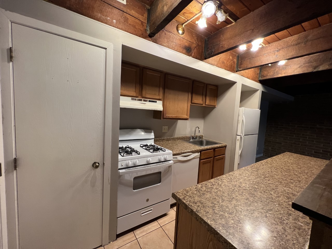 410 Kenneth Circle Elgin, IL 60120 - Photo 4 of 15 a kitchen with a stove and a refrigerator