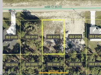 666 Nimitz Boulevard Lehigh Acres, FL 33974 - Photo 1 of 1 a view of a shop on the street