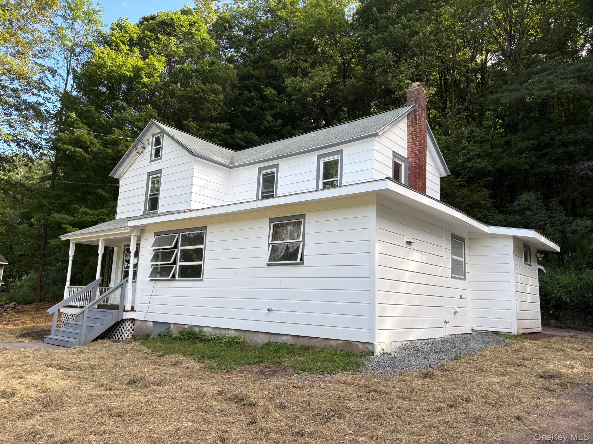 476 Old Rte 17 Livingston Manor, NY 12758 - Photo 35 of 39 View of front of house with a chimney and view of scattered trees