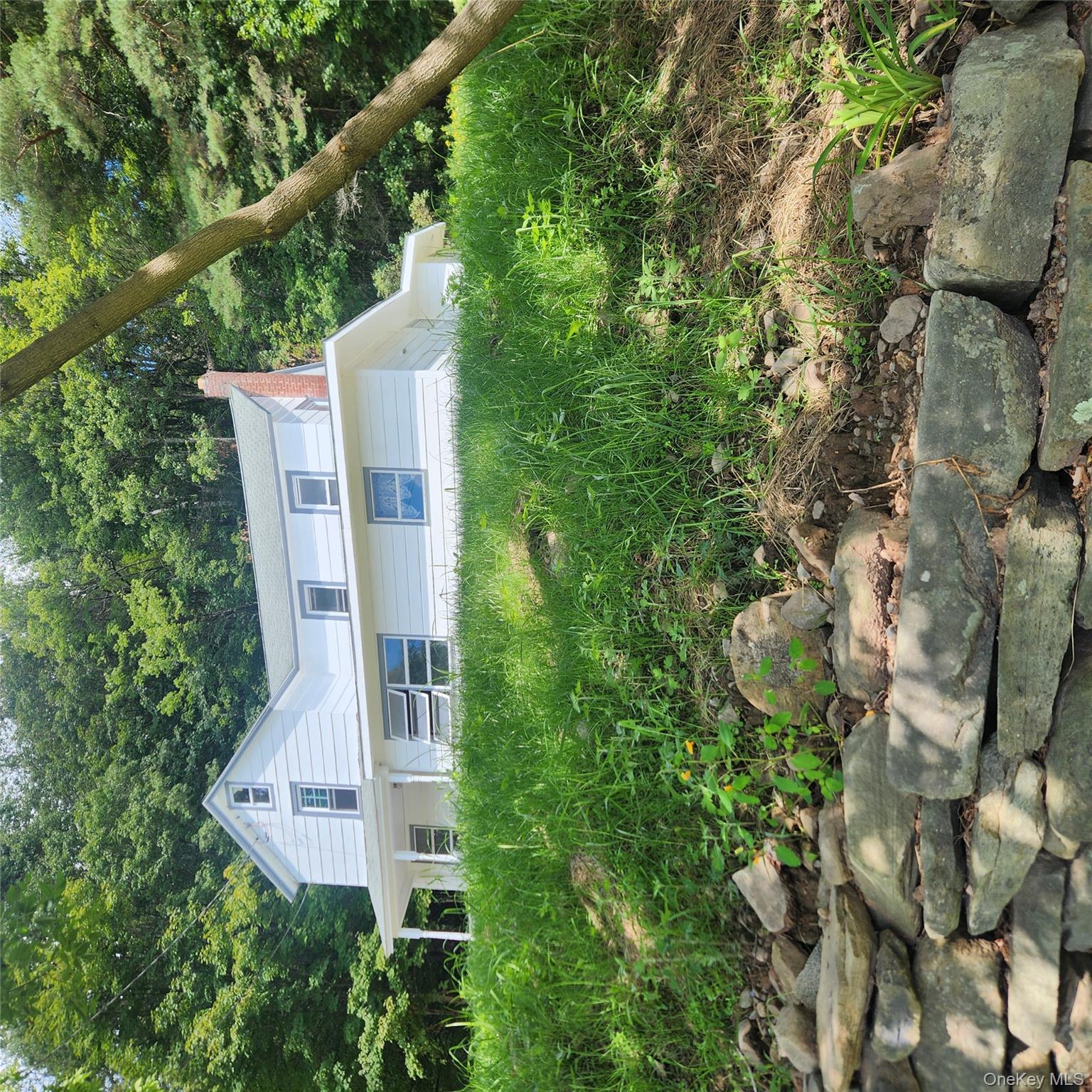 476 Old Rte 17 Livingston Manor, NY 12758 - Photo 38 of 39 View of front of house featuring a chimney