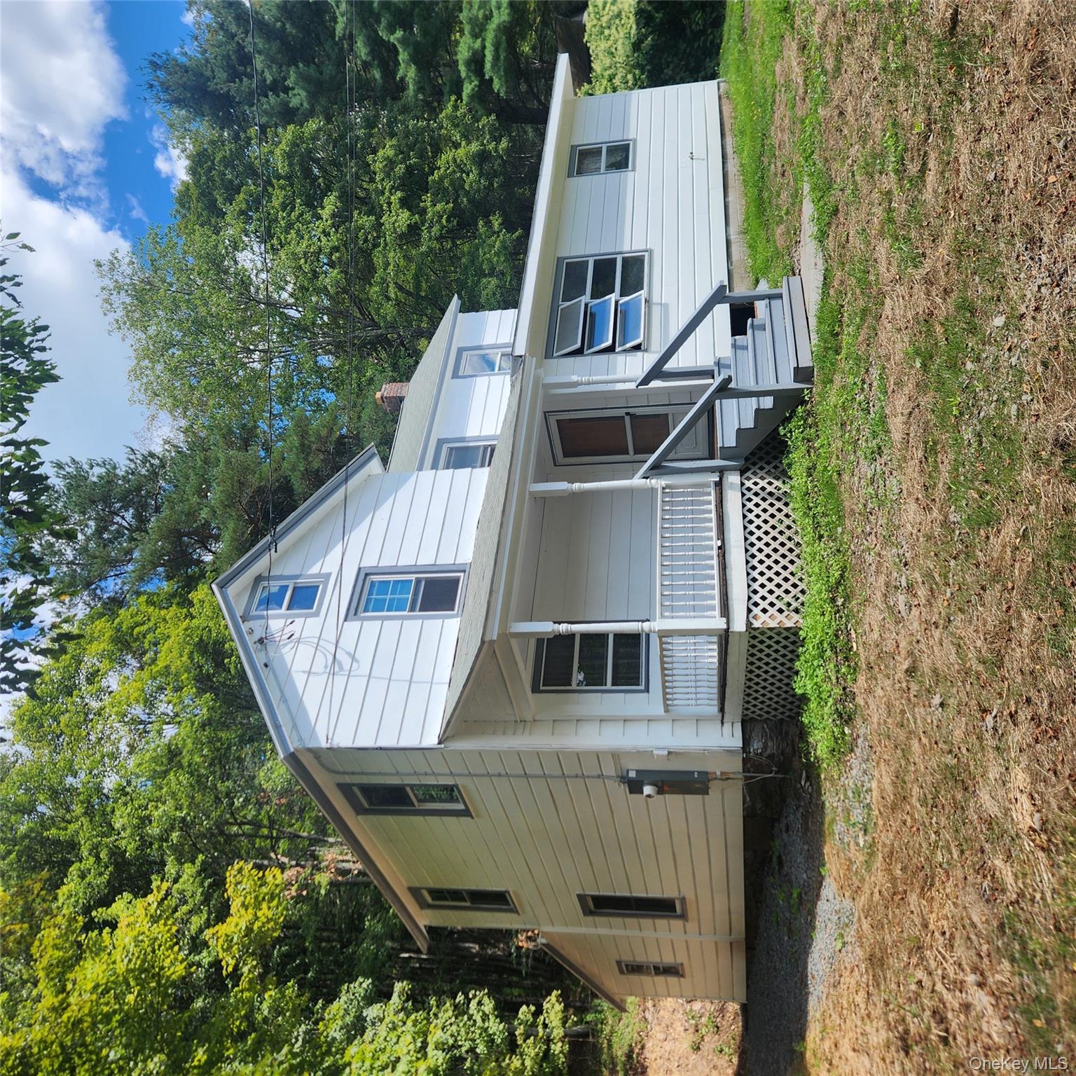 476 Old Rte 17 Livingston Manor, NY 12758 - Photo 39 of 39 View of front of house with covered porch and a chimney