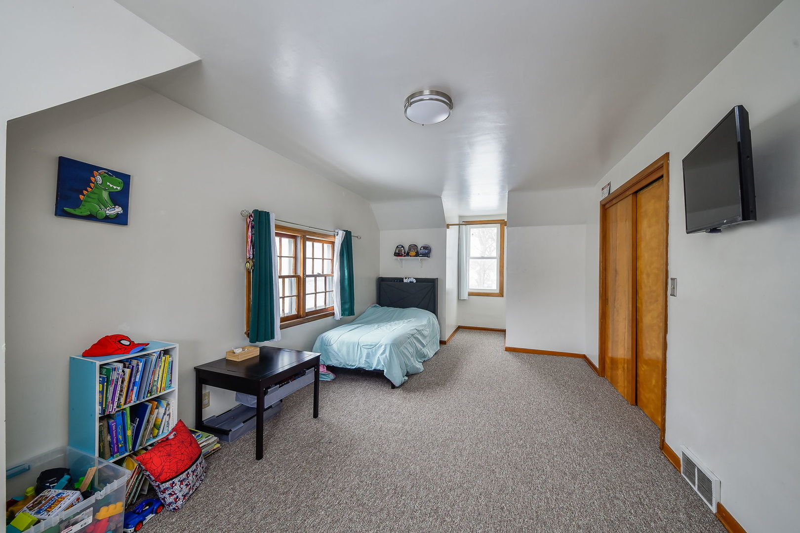 118 Stiles Street Genoa, IL 60135 - Photo 12 of 21 a bedroom with furniture and a window