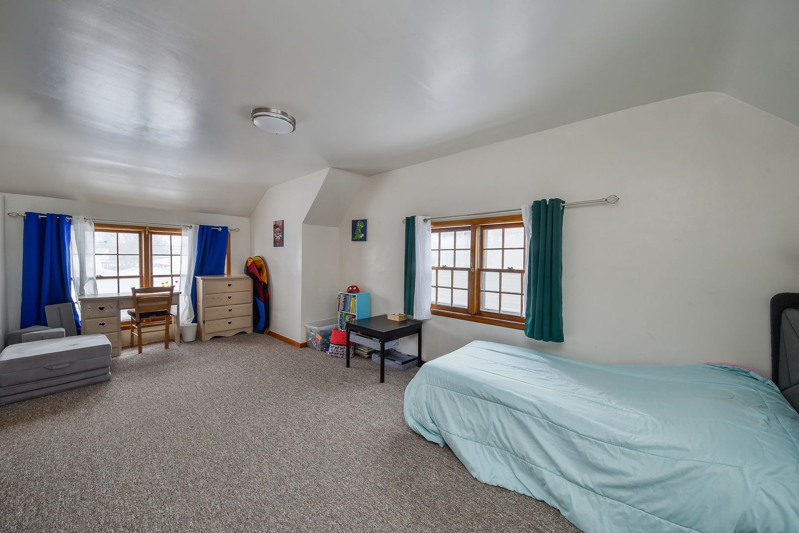 118 Stiles Street Genoa, IL 60135 - Photo 13 of 21 a spacious bedroom with a bed and a furniture