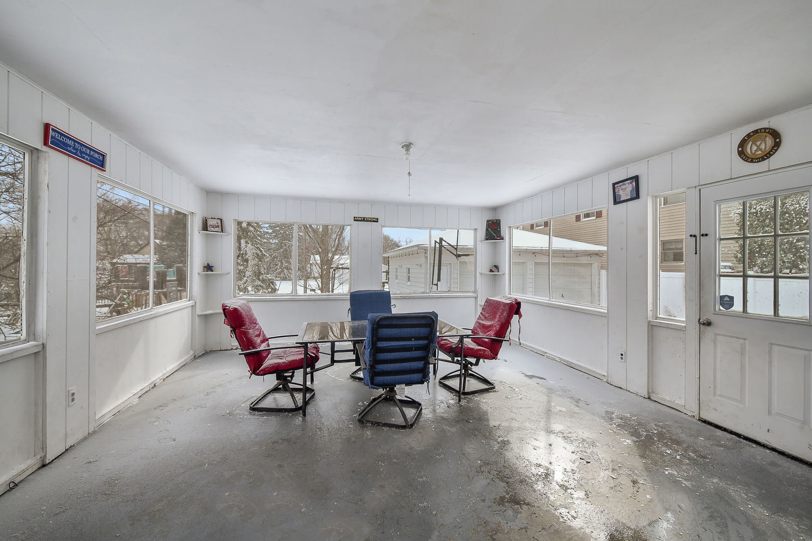 118 Stiles Street Genoa, IL 60135 - Photo 6 of 21 a living room with furniture and large windows