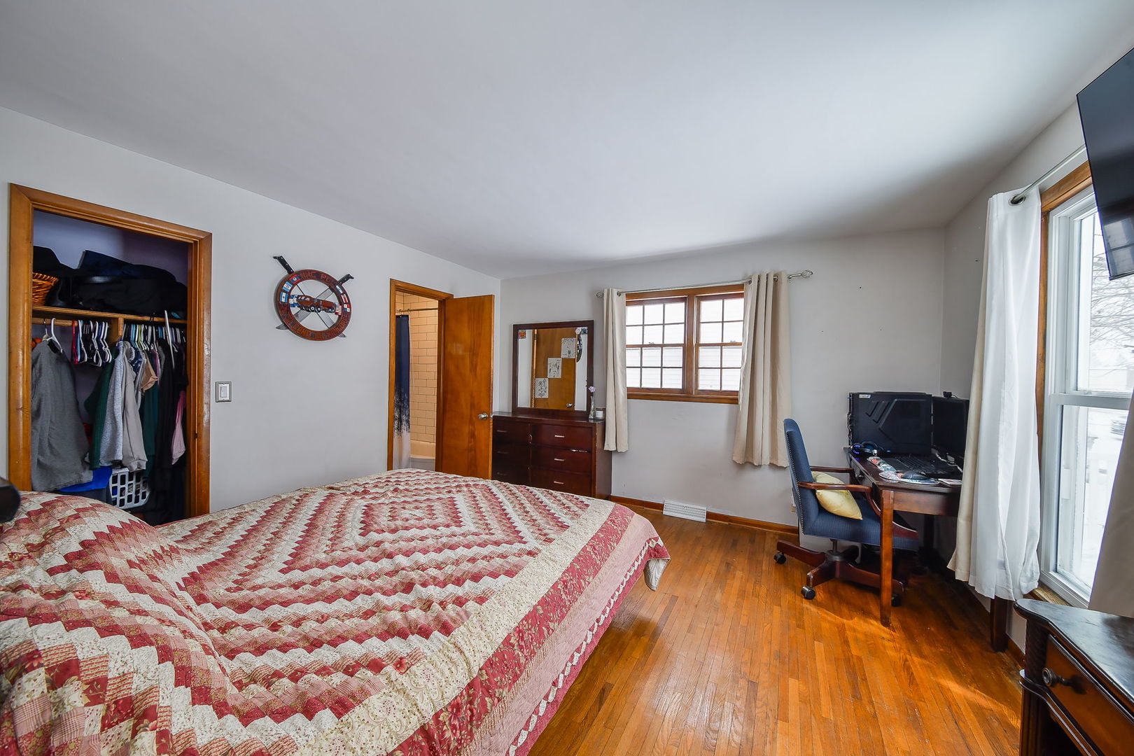 118 Stiles Street Genoa, IL 60135 - Photo 10 of 21 a bedroom with a bed and a window