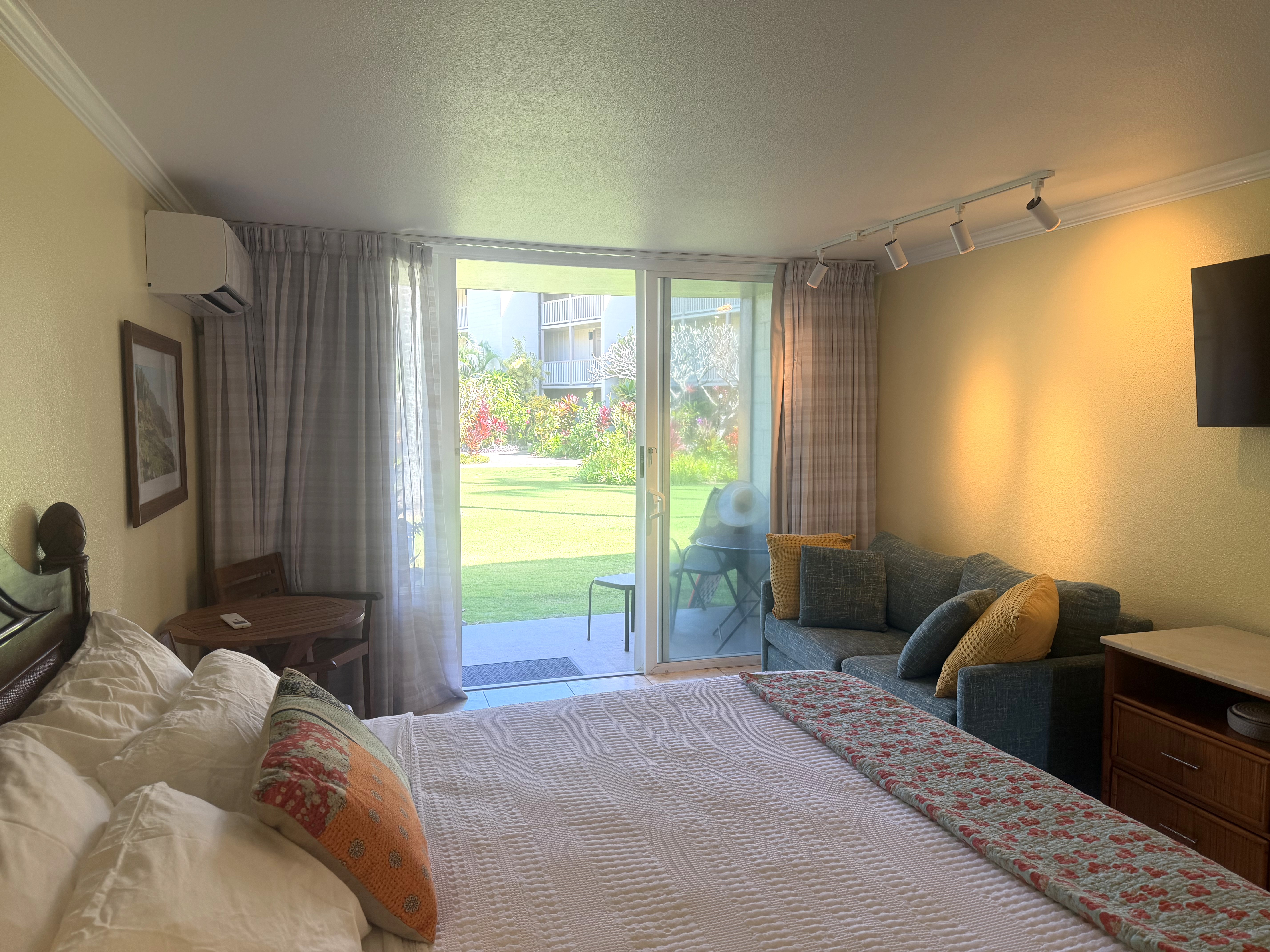 440 Aleka Place, Unit 156 Kapaa, HI 96746 - Photo 17 of 27 a bedroom with a bed and a window