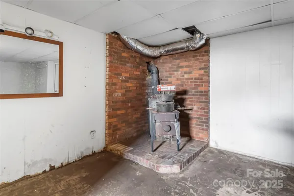 a bathroom with a shower and a sink