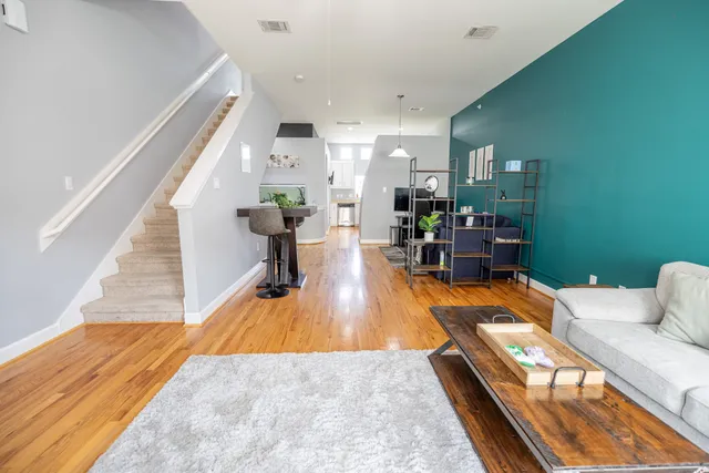 a view of a living room and dining room