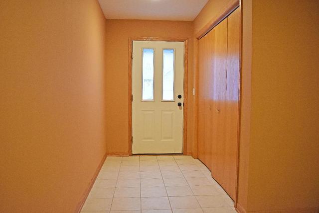 626 South Peace Road Sycamore, IL 60178 - Photo 2 of 24 a view of a hallway with wooden floor