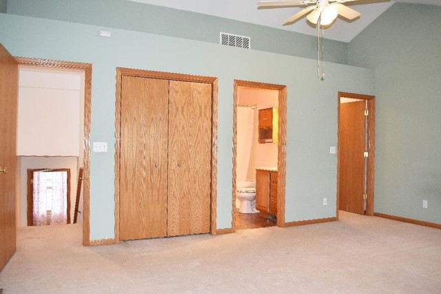 626 South Peace Road Sycamore, IL 60178 - Photo 11 of 24 an empty room with windows and closet