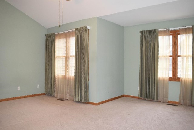 626 South Peace Road Sycamore, IL 60178 - Photo 13 of 24 an empty room that has a large window