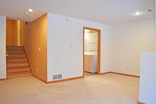 626 South Peace Road Sycamore, IL 60178 - Photo 16 of 24 a view of a hallway with wooden floor and entryway