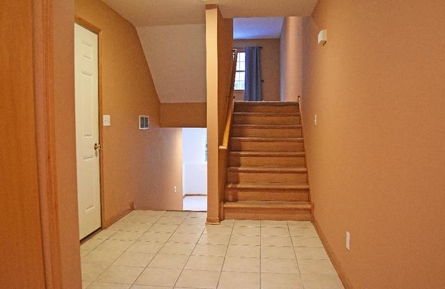626 South Peace Road Sycamore, IL 60178 - Photo 3 of 24 a view of entryway and hall with wooden floor
