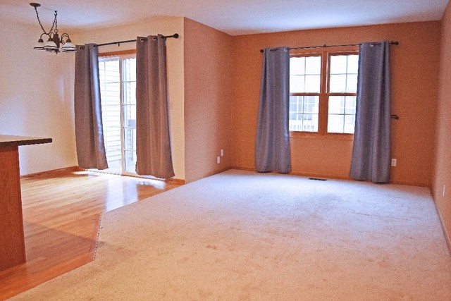626 South Peace Road Sycamore, IL 60178 - Photo 8 of 24 an empty room with windows and closet