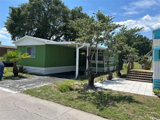 a view of a backyard with a garden