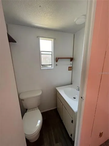 a house view with a backyard space