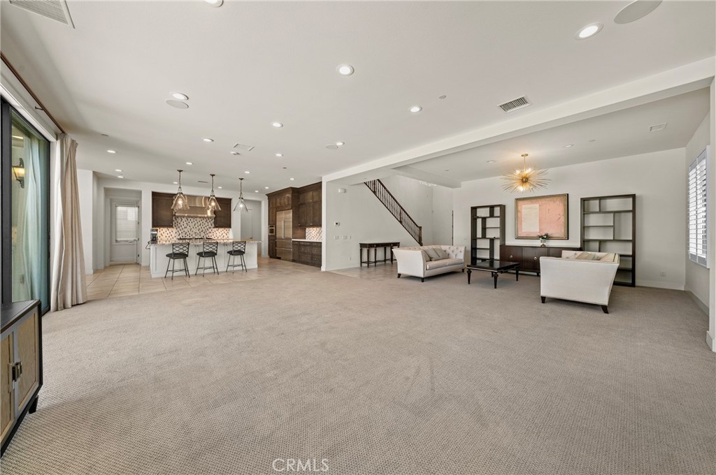 52 Eider Run Irvine, CA 92618 - Photo 36 of 46 a view of livingroom with furniture and white walls
