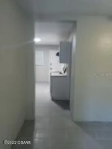 a room with cabinets and dust bin