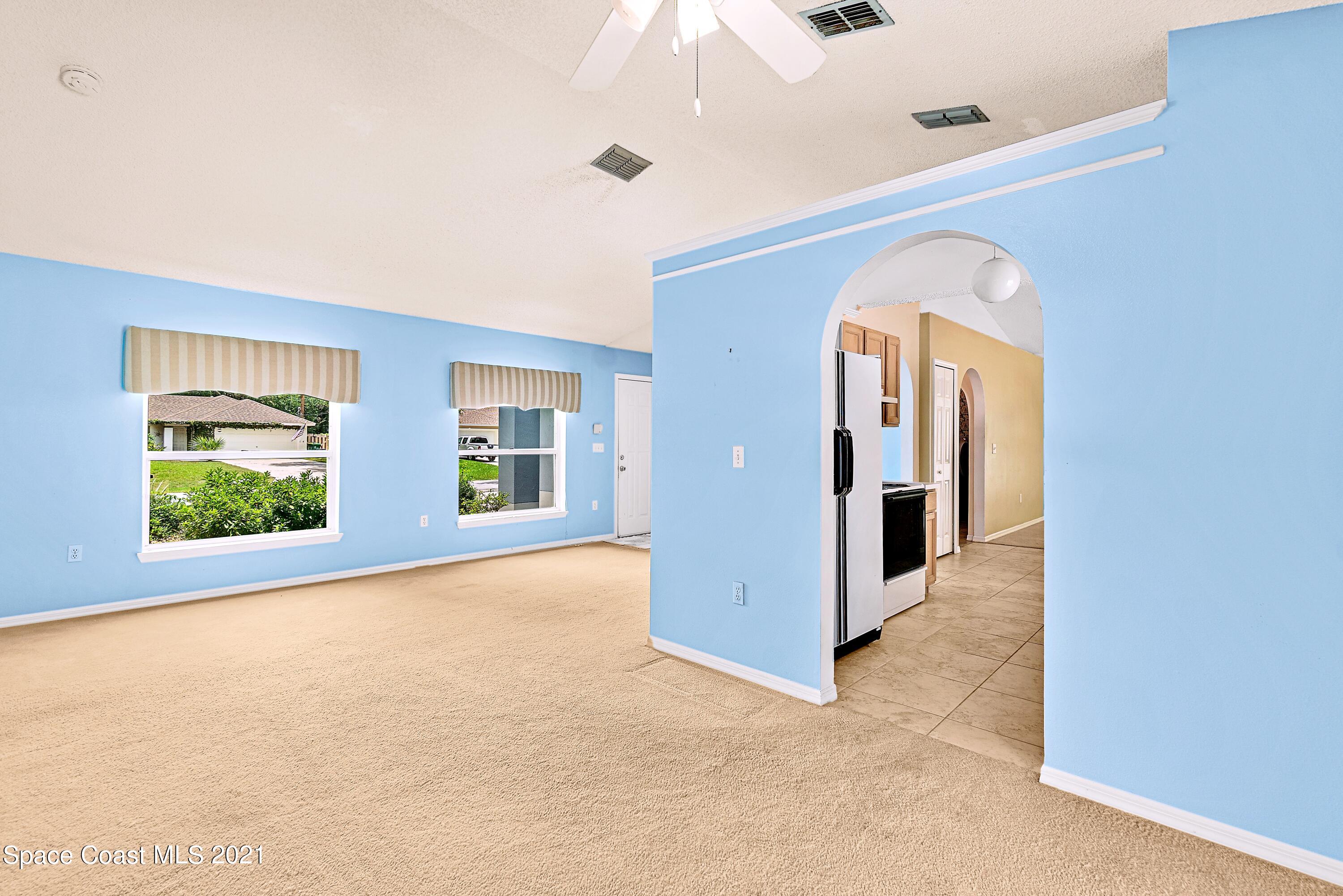 7250 Camilo Road Cocoa, FL 32927 - Photo 11 of 45 an empty room with windows and closet