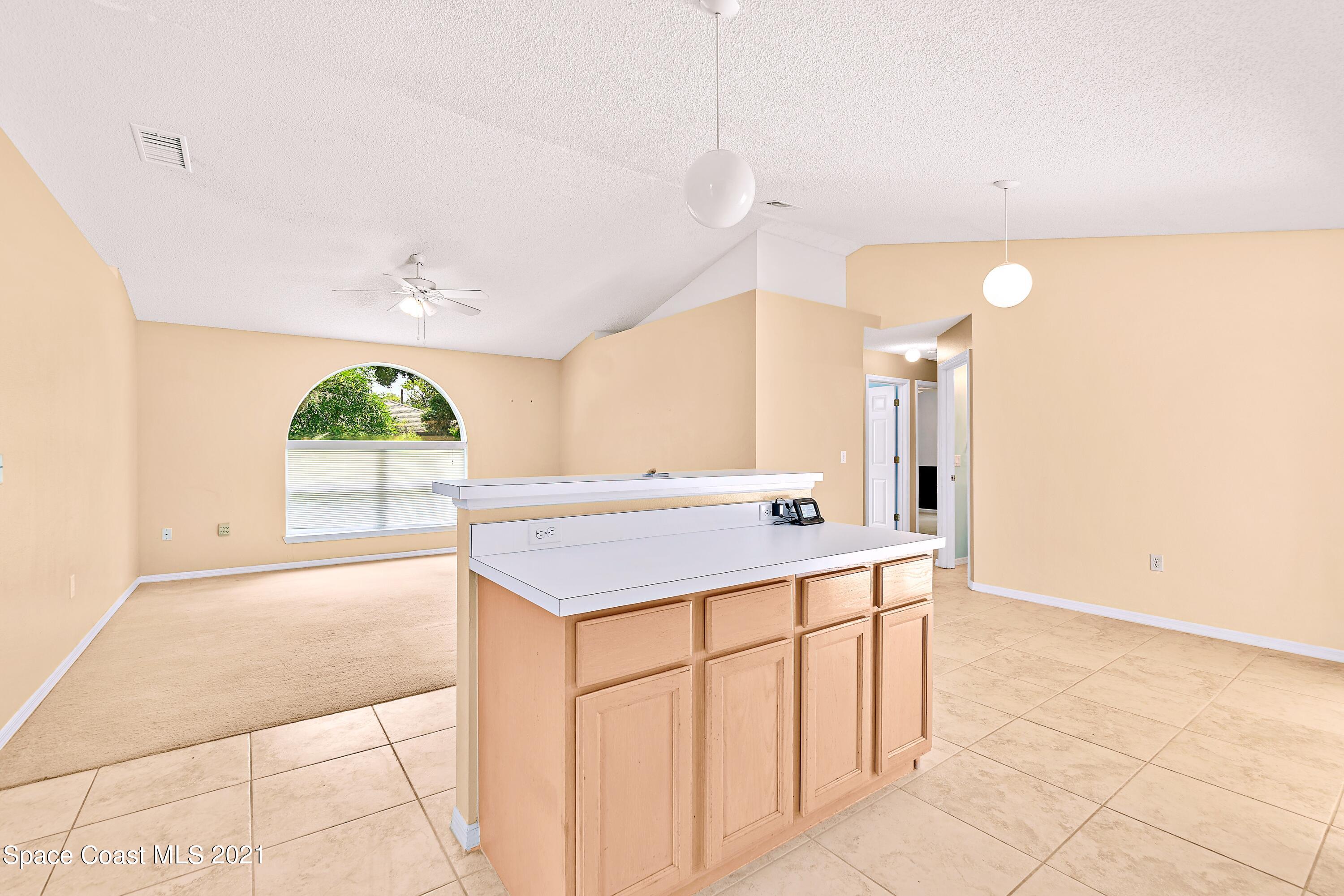 7250 Camilo Road Cocoa, FL 32927 - Photo 19 of 45 a bathroom with a sink a vanity and mirror