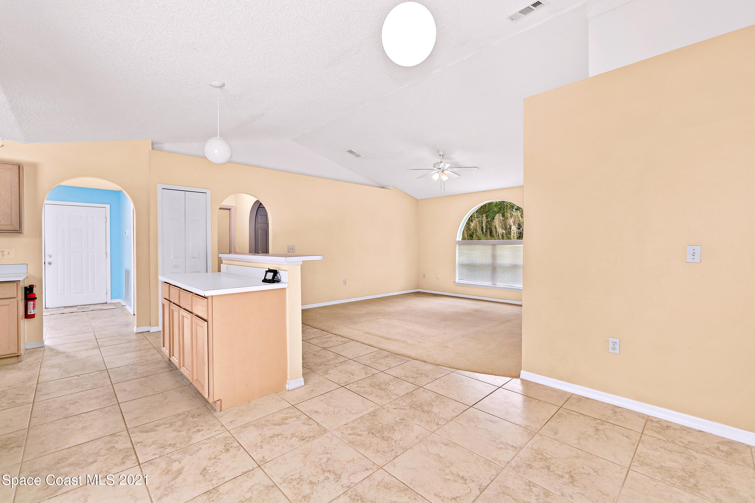 7250 Camilo Road Cocoa, FL 32927 - Photo 21 of 45 a bathroom with a sink a vanity and mirror