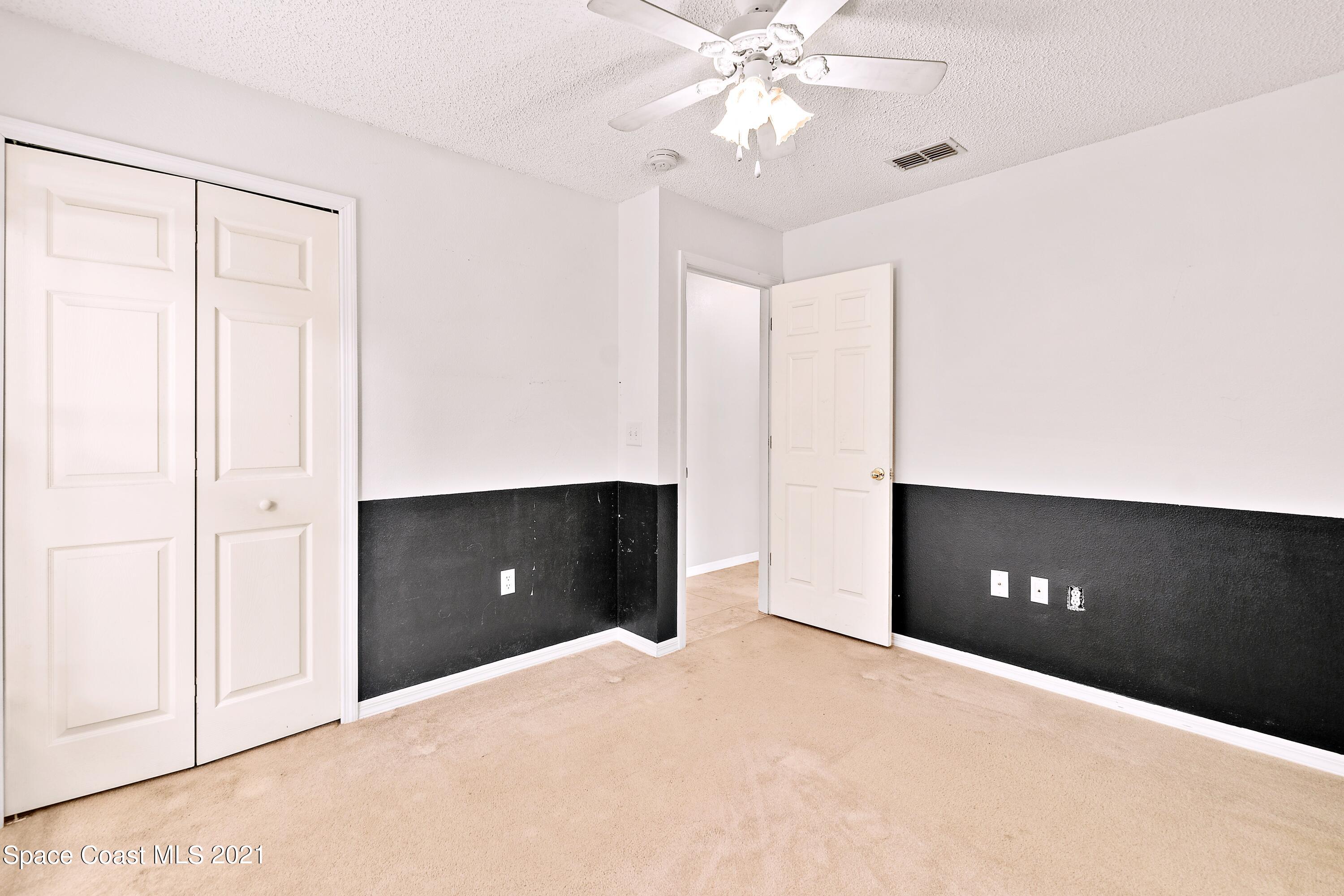 7250 Camilo Road Cocoa, FL 32927 - Photo 29 of 45 a view of an empty room with fan and window