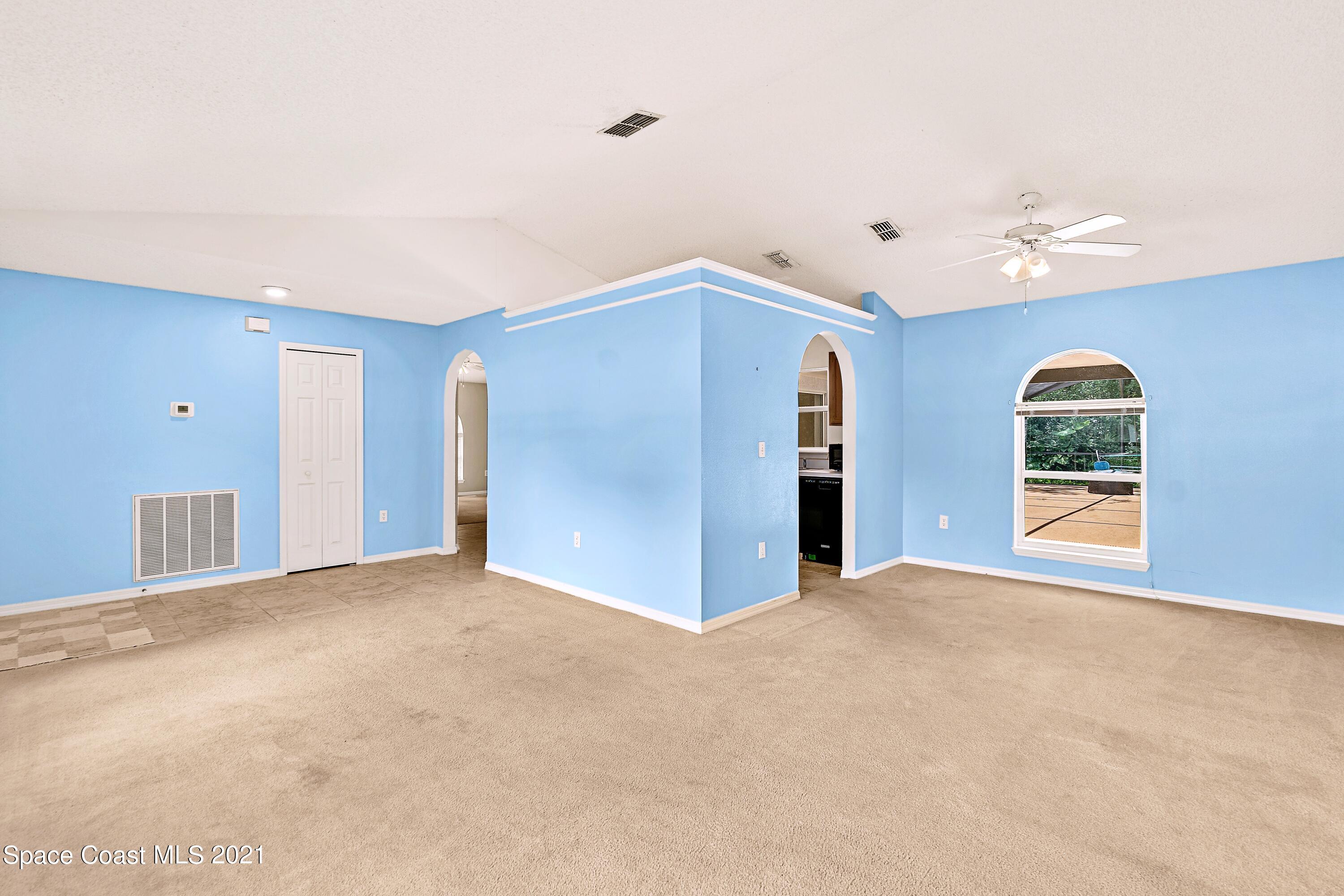 7250 Camilo Road Cocoa, FL 32927 - Photo 9 of 45 a view of an empty room with a window