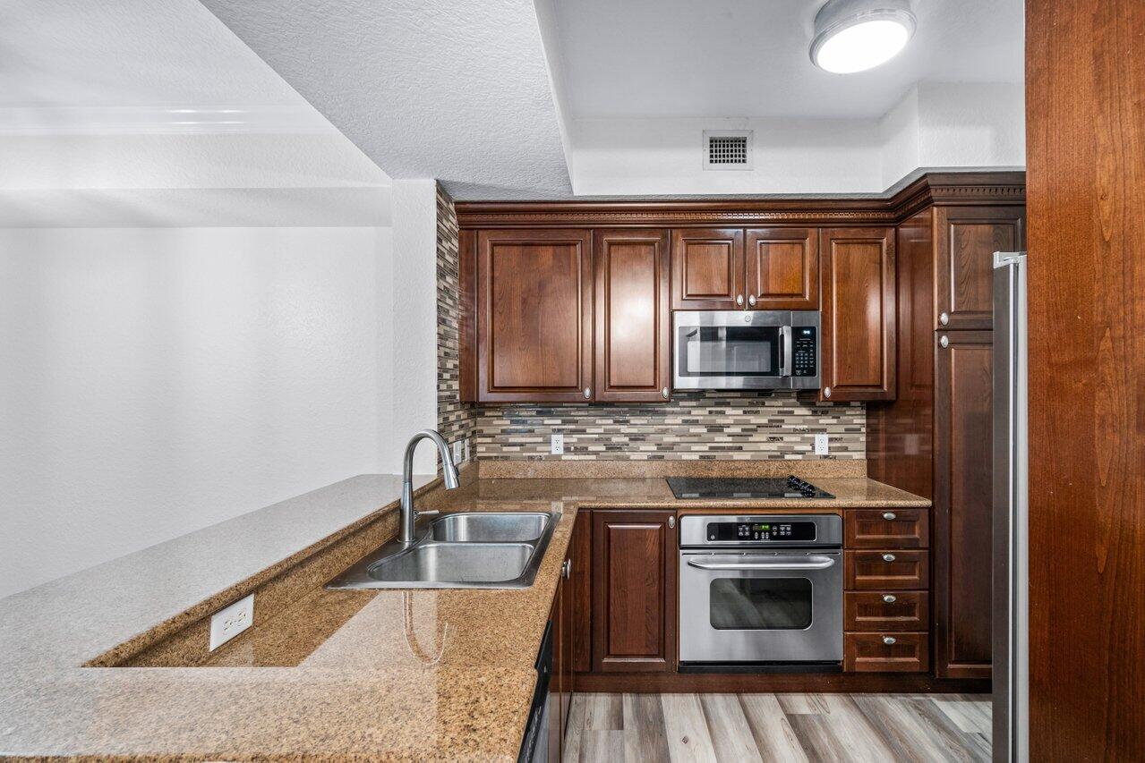 1117 Renaissance Way, Unit 117 Boynton Beach, FL 33426 - Photo 10 of 31 010-1RenaissanceWay-117-BoyntonBeach-FL-