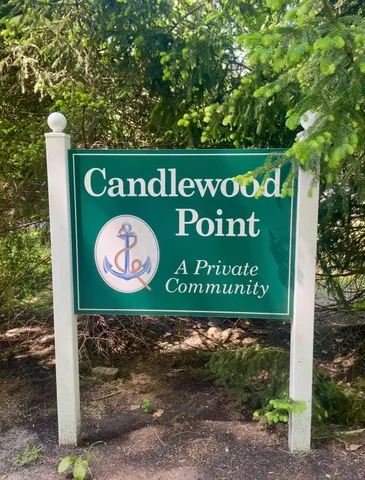 a sign on the side of a road