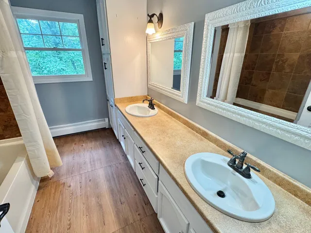 a view of a bathtub in a room