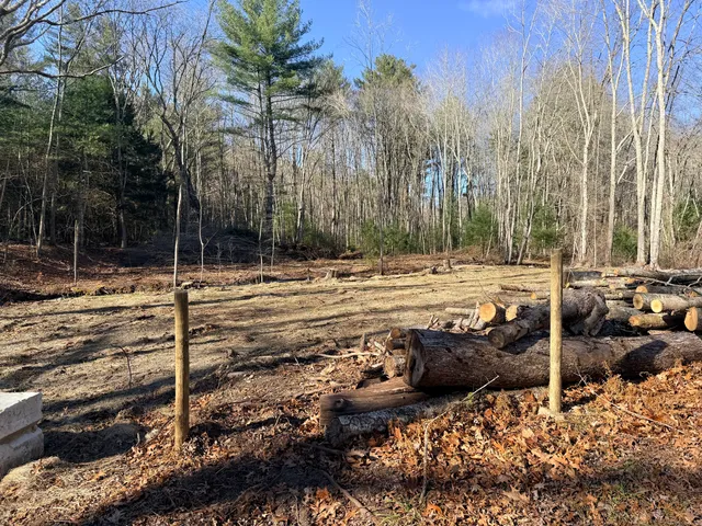 a view of a patio with a yard