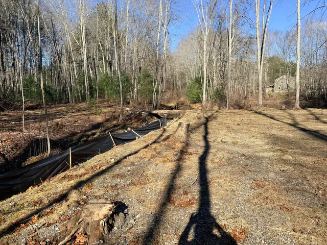 a view of swimming pool with chairs
