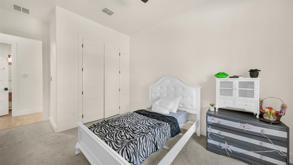 374 Glade Valley Road Azle, TX 76020 - Photo 22 of 38 a bedroom with a bed and a window