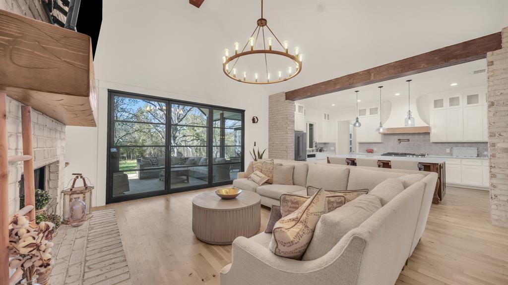 374 Glade Valley Road Azle, TX 76020 - Photo 5 of 38 a living room with furniture a table and chairs