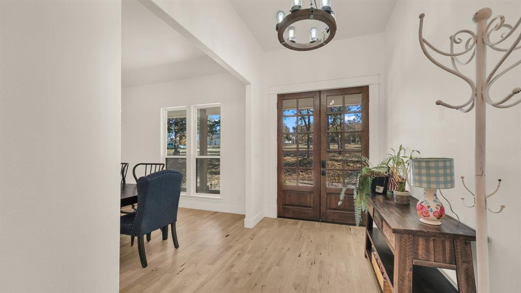 374 Glade Valley Road Azle, TX 76020 - Photo 9 of 38 a view of a livingroom with furniture and windows
