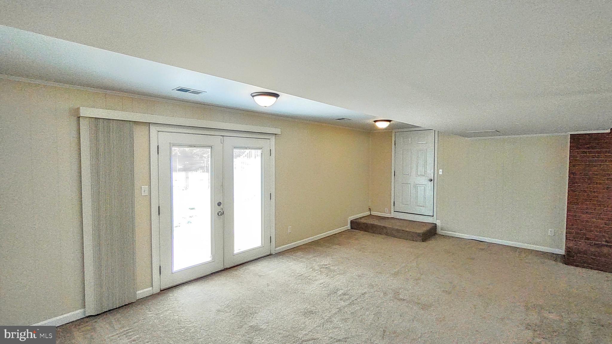 44617 Joy Chapel Road Hollywood, MD 20636 - Photo 34 of 52 Doors to patio and garage