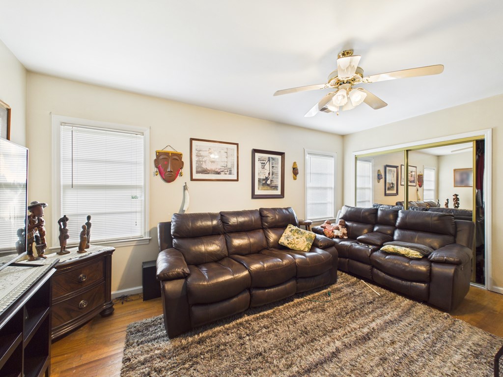 1608 39th Street Columbus, GA 31904 - Photo 26 of 63 a living room with furniture kitchen and a window