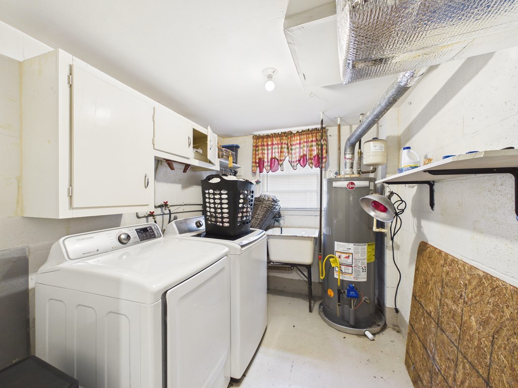 1608 39th Street Columbus, GA 31904 - Photo 41 of 63 a utility room with dryer and washer